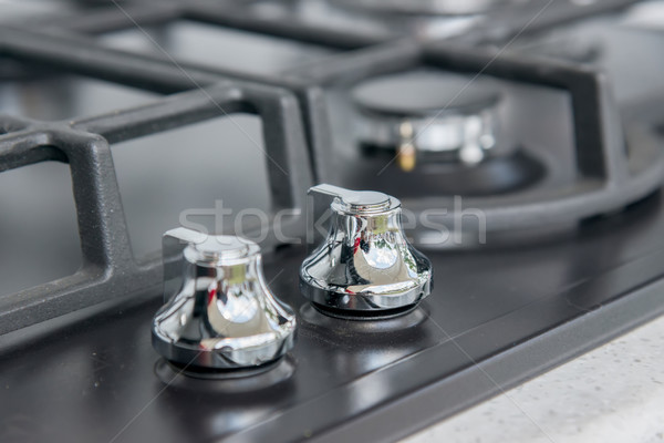 New and modern shining metal gas cooker Stock photo © vlaru