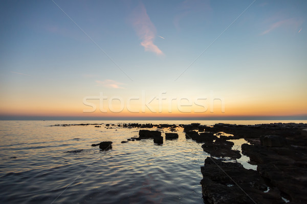 gorgeous sunset on the rocky coast of Adriatic Stock photo © vlaru