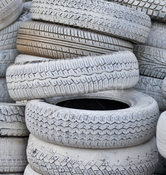 close-up. the white automobile tires dumped in a a big pile Stock photo © vlaru