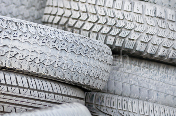 close-up. the white automobile tires dumped in a a big pile Stock photo © vlaru