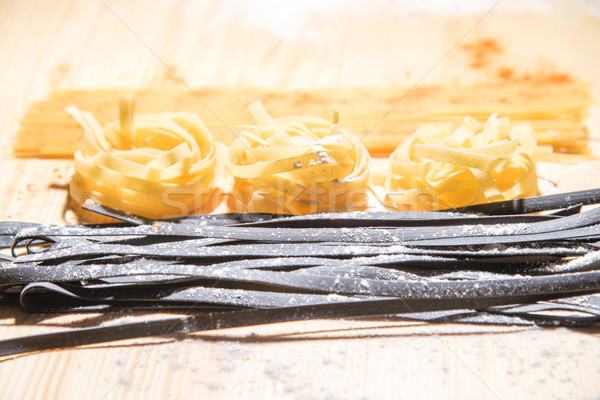 Spaghetti ancora vita nero pasta farina tavolo in legno Foto d'archivio © vlaru