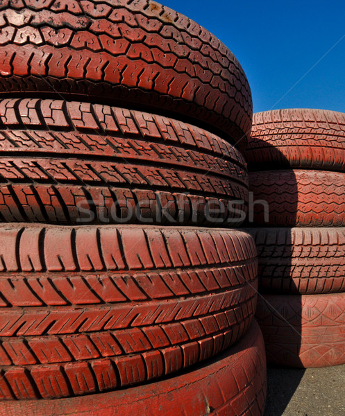 close up of racetrack fence of  red old tires Stock photo © vlaru