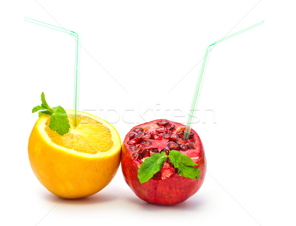 orange and pomegranate with a straw on a white background Stock photo © vlaru