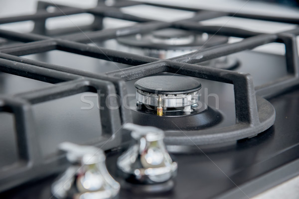 Stock photo: New and modern shining metal gas cooker