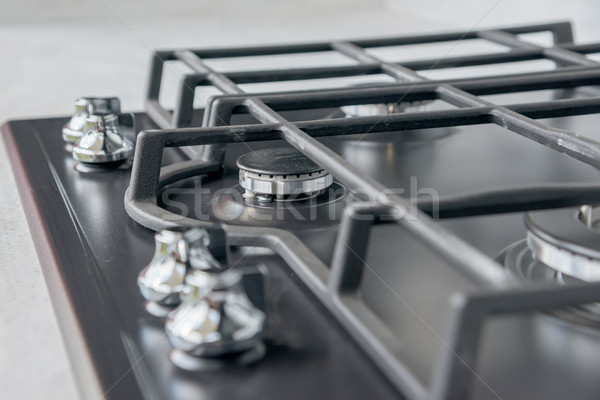 Stock photo: New and modern shining metal gas cooker