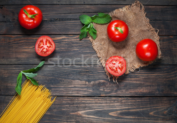 Italian pasta ingredients on white wooden table, top view, copy space Stock photo © voloshin311