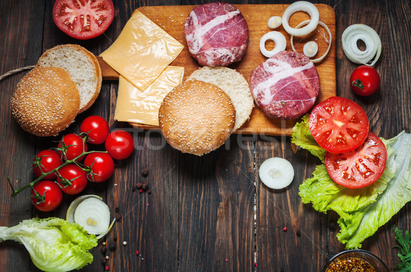 Ingredients for making homemade burger on wooden cutting board Stock photo © voloshin311