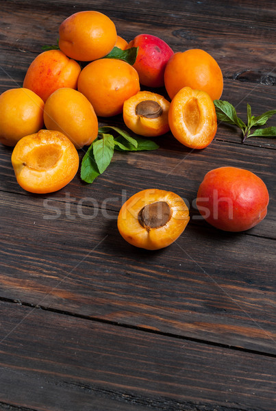 apricots on dark wood background Stock photo © voloshin311