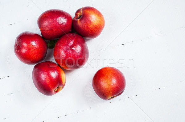 nectarines on white wooden table. Close up Stock photo © voloshin311