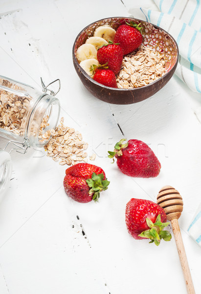 Healthy breakfast with cereals, banana and strawberry Stock photo © voloshin311