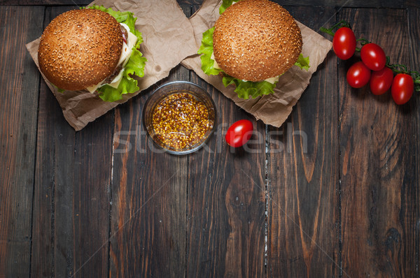 Fresh burger closeup on rustic wooden table Stock photo © voloshin311