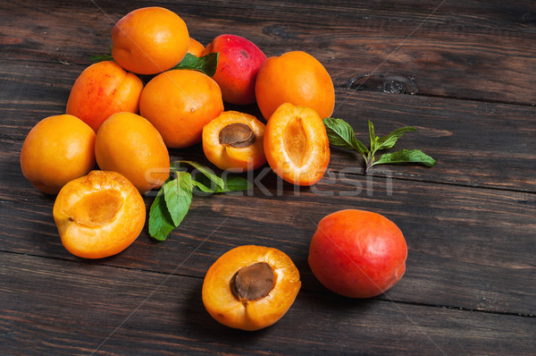 apricots on dark wood background Stock photo © voloshin311