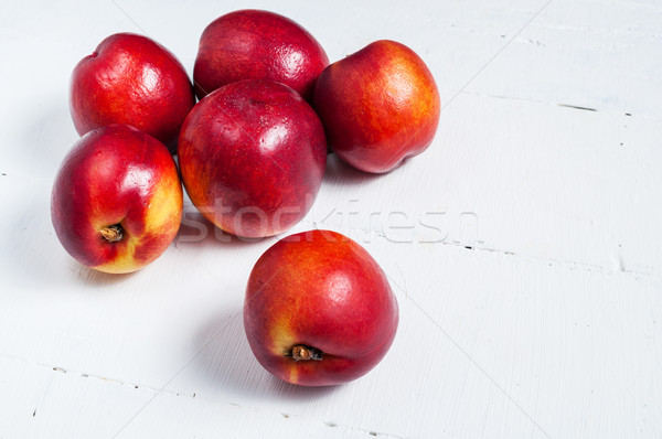 nectarines on white wooden table. Close up Stock photo © voloshin311