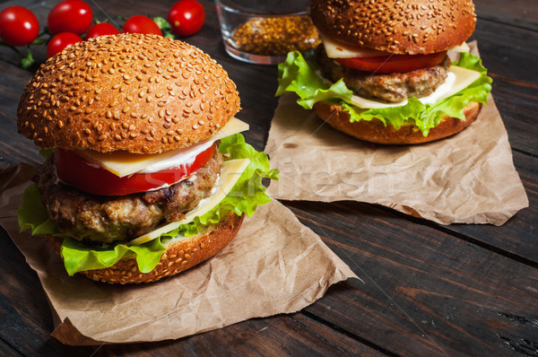 Fresh burger closeup on rustic wooden table Stock photo © voloshin311