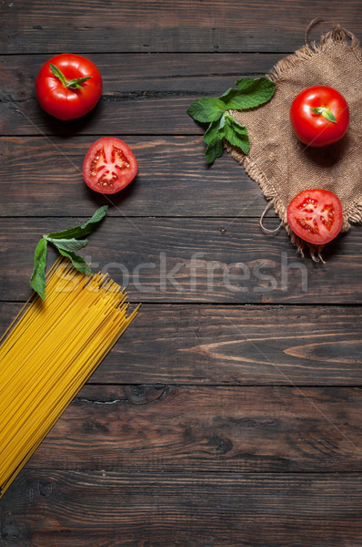Italian pasta ingredients on white wooden table, top view, copy space Stock photo © voloshin311