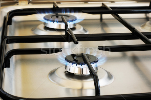 Gas acciaio inossidabile messa a fuoco selettiva cucina blu fiamma Foto d'archivio © vtls