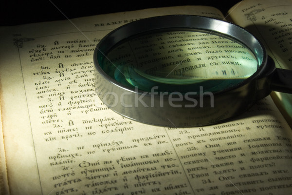 Old bible page and lens Stock photo © vtorous