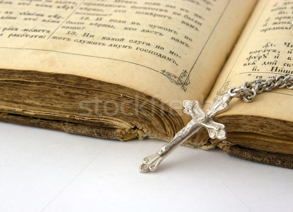 Old bible and silver cross Stock photo © vtorous
