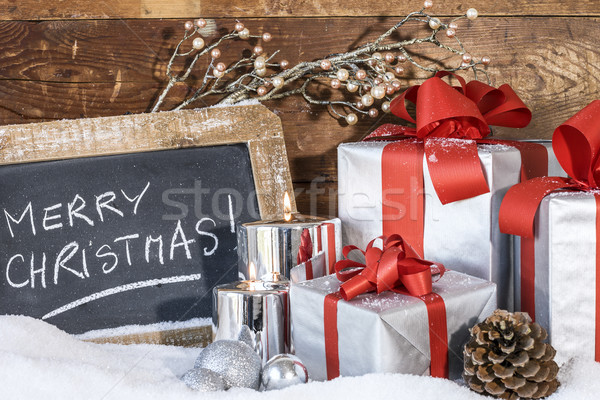 gifts with lighted candles Stock photo © vwalakte