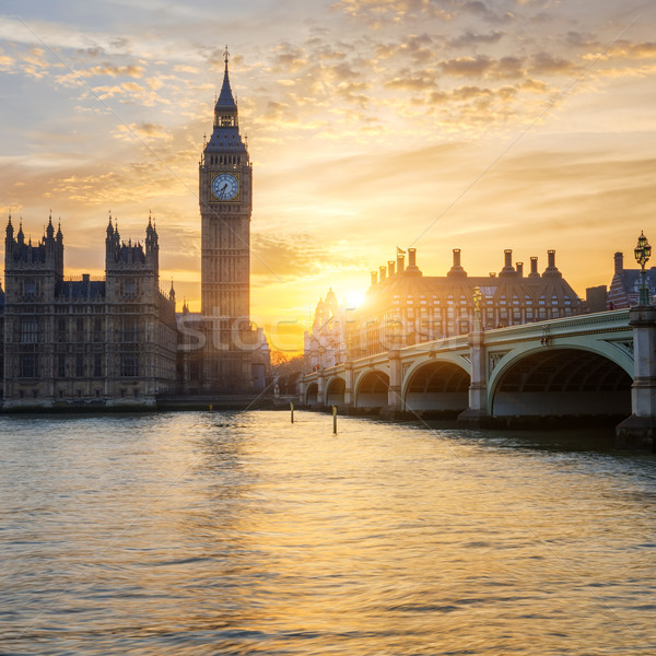 Big Ben reloj torre puesta de sol Londres manos Foto stock © vwalakte