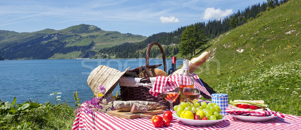 Picnic in french alps with lake  Stock photo © vwalakte