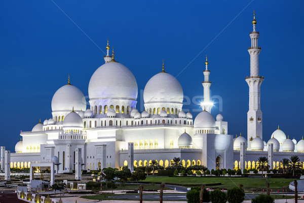 View of famous Abu Dhabi Sheikh Zayed Mosque by night Stock photo © vwalakte