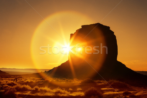 famous sunrise at Monument Valley Stock photo © vwalakte