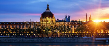 Ver Lyon cidade pôr do sol céu edifício Foto stock © vwalakte
