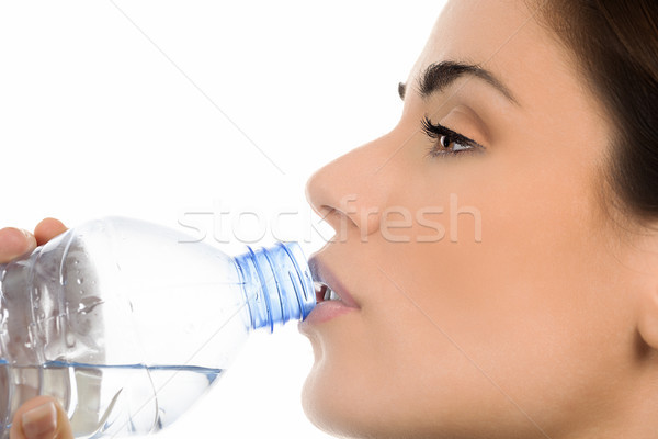 Young woman drinking water Stock photo © vwalakte
