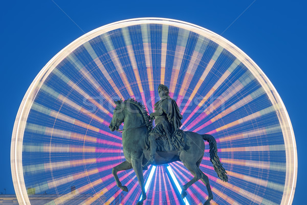 Statue of King Louis XIV by night Stock photo © vwalakte