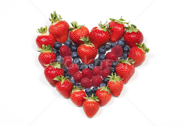 Stock photo: red fruit heart on white background