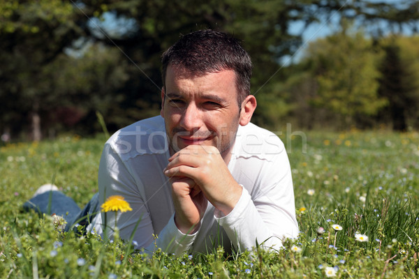 man lying on the grass Stock photo © vwalakte