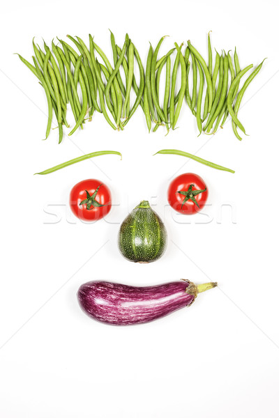 Függőleges vidám arc zöldségek fehér étel szem Stock fotó © vwalakte
