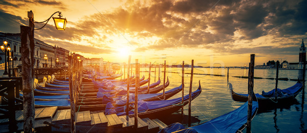Panoramic view of Venice with gondolas at sunrise Stock photo © vwalakte