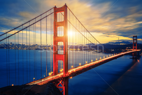 Híres Golden Gate híd napfelkelte San Francisco USA égbolt Stock fotó © vwalakte
