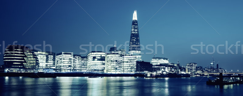 Panoramic view of new London city hall at night Stock photo © vwalakte
