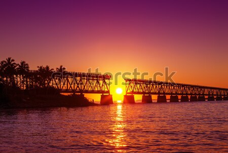 sunset at broken bridge Stock photo © vwalakte