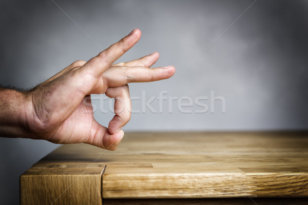 Man shoots with finger Stock photo © w20er