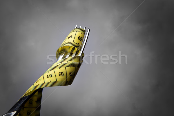 Stock photo: Tape measer with fork