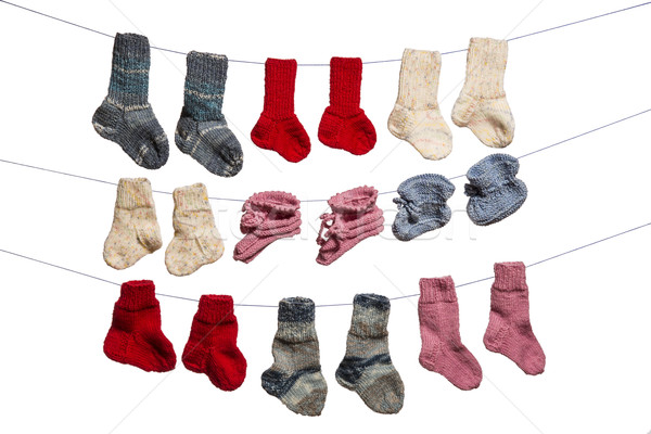 Baby socks on white background Stock photo © w20er