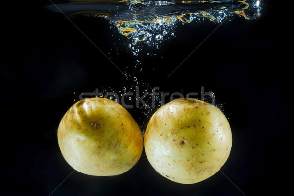 Potatoe under water Stock photo © w20er