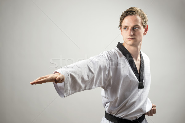 Taekwondo homem cinza mão olho Foto stock © w20er