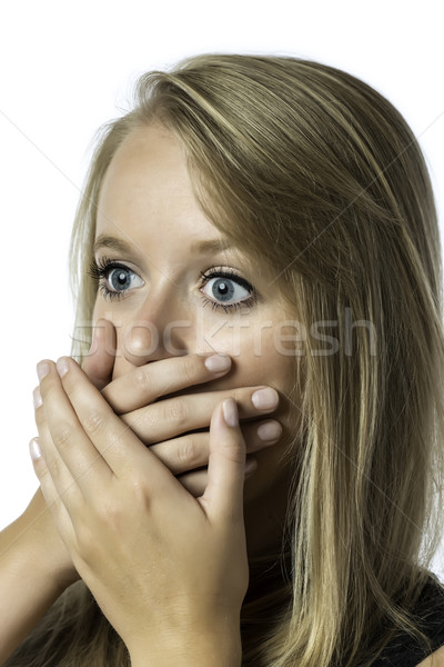 Stock photo: Portrait of shocked young girl