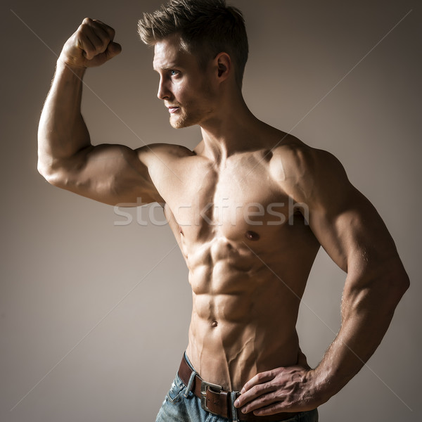 Posing body builder Stock photo © w20er