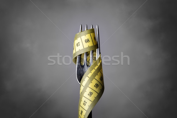 Tape measer with fork Stock photo © w20er