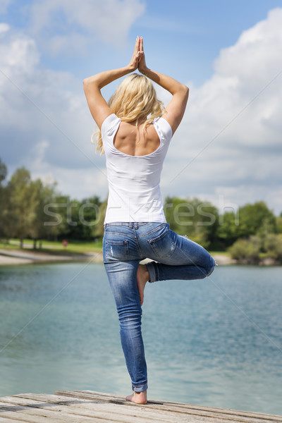 Blond woman yoga exercise Stock photo © w20er
