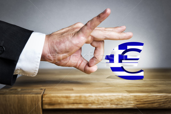Man shoots greek Euro sign off Stock photo © w20er