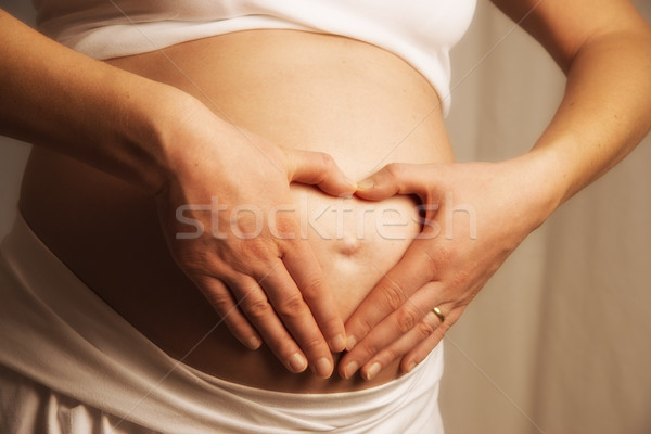 Stock fotó: Szív · kéz · baba · dudorodás · közelkép · kéz · a · kézben
