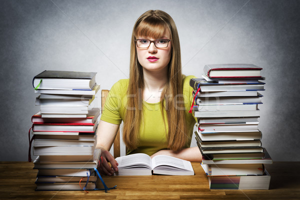 young woman is reading book Stock photo © w20er