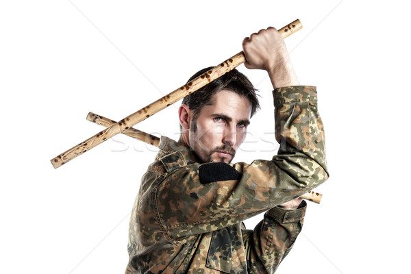Zelfverdediging instructeur bamboe mannelijke camouflage oefening Stockfoto © w20er